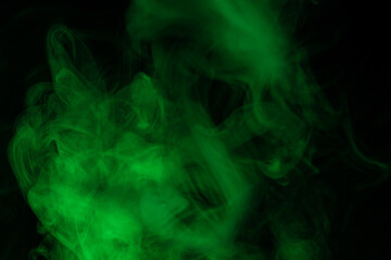 Green steam on a black background.