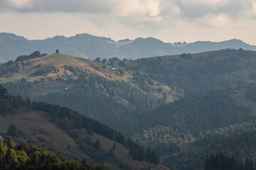 mountain slopes in the Ukrainian Carpathians. mountain tops and forests on a background of blue sky