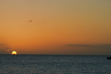 Naklejka na ściany i meble Sonnenuntergang am karibischen Meer
