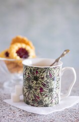 Isolated cup of coffee with spoon and bowl of cookie sweet dessert chocolate mug coffee time espresso capuccinno latte caffeine drinks morning beverage nobody