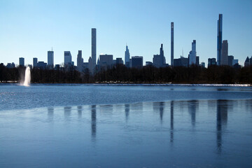 The billionaire row skyscrapers behind the Central Park reservoir in winter