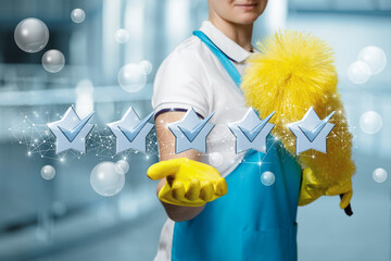 Cleaning lady with a smile on her face shows five star service .