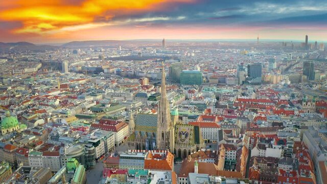 Vienna skyline aerial view drone footage in 4k, flying over old town church cathedra over St. Stephen's Cathedral in Vienna austria.
