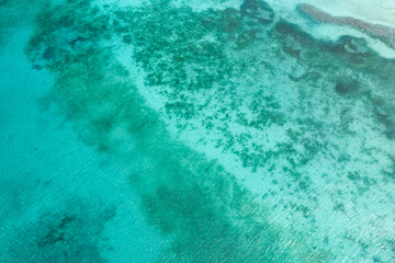 Fototapeta na wymiar Crystal azure water in caribbean sea with coral reefs