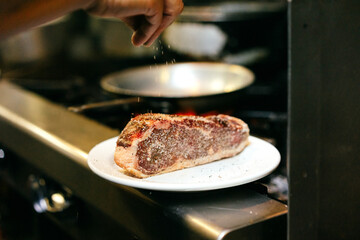 Chef cooking steak