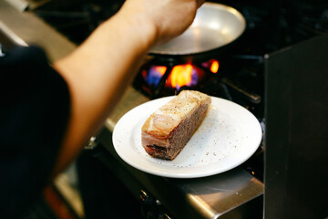 Chef cooking steak