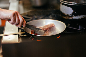 Chef cooking steak