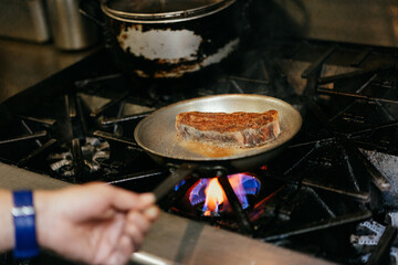 Chef cooking steak