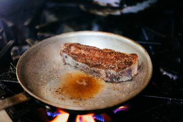 Chef cooking steak