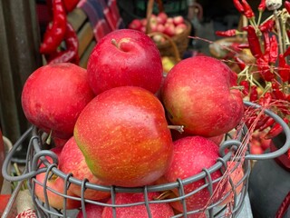 Red apples fruits harvest. Ripe tasty glossy apples.