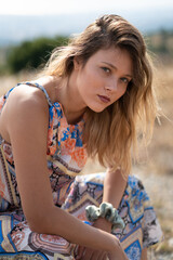Naklejka premium Natural Looking Young Beautiful Woman with Hazel eyes posing in the fields, no post editing