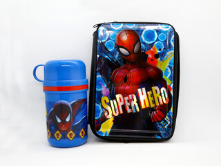 Fototapeta premium Spider-Man. Spider man. Toy. Comic. Movies. Peter parker. Superheroe. Super heroe. School pencil case for children. School supplies. Thermos for children's drinks. Plastic bottle with glass included.