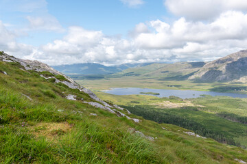 Fototapeta na wymiar Mountains view over Lough Inagh from top of Derryclare peack.