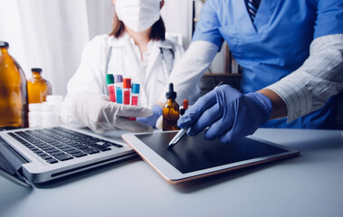 medical technology or medical network. doctor using digital tablet with screen interface.