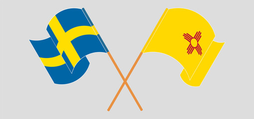 Crossed and waving flags of Sweden and the State of New Mexico
