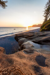 Unique Rock Formation at Sandcut Beach on the West Coast of Pacific Ocean. Summer Sunny Sunset. Canadian Nature Landscape Background. Located near Victoria, Vancouver Island, BC, Canada.