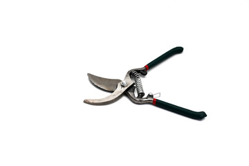 Pruning scissors (Pruning shears, Garden secateurs) with green grip isolated on white background