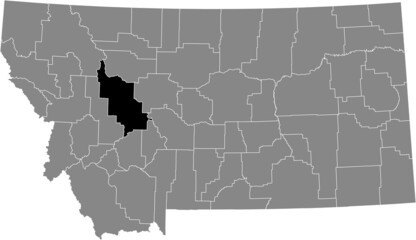 Black highlighted location map of the Lewis and Clark County inside gray map of the Federal State of Montana, USA