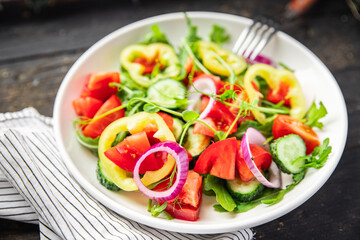 salad vegetables tomato, cucumber, pepper, onion, olive oil healthy food fresh portion veggie ready to eat meal snack on the table copy space food background rustic keto or paleo diet vegan