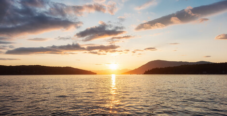 Canadian Nature Landscape View of the Gulf Islands on West Coast of Pacific Ocean. Dramatic Colorful Summer Sunset Located near Victoria, Vancouver Island, British Columbia, Canada.