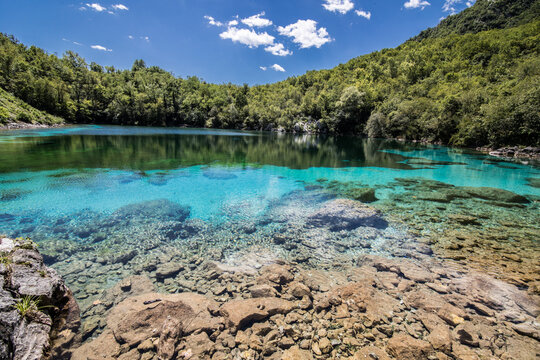Serene landscape of the turquoise Lake Cornino in Italy