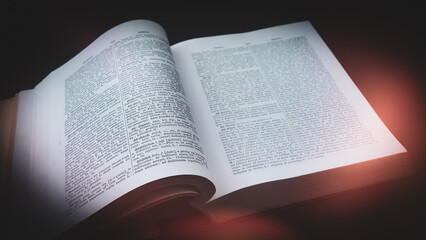 Fototapeta premium Ancient Greek, Latin Dictionary with red light, Education, knowledge concept