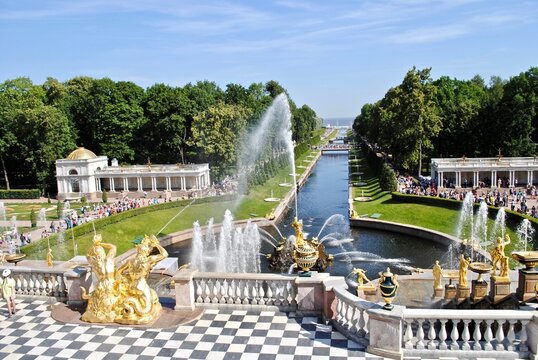 Petergof, Saint Petersburg, Russia: The Grand Cascade and Samson Fountain at the  Peterhof Palace. The water flows down the cascade into a semicircular pool then out to the Sea Channel. 