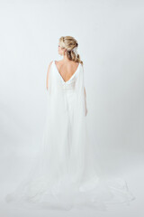 Fototapeta na wymiar blonde caucasian bride on white dress bridal dress concept