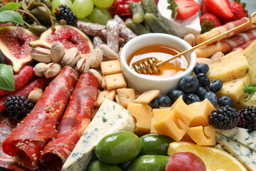 Set of different delicious appetizers as background, closeup