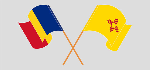 Crossed and waving flags of Romania and the State of New Mexico