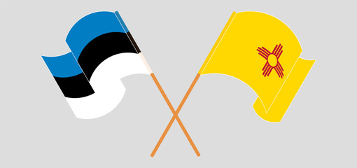 Crossed and waving flags of Estonia and the State of New Mexico