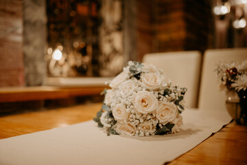 wedding bouquet in restaurant, low light at night