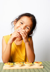 Asian baby girl portrait with homemade bagery food backgrounds