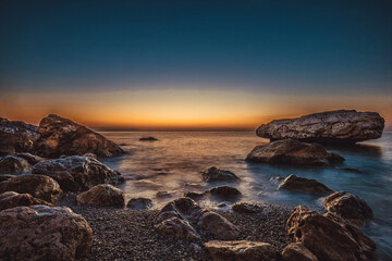 Fototapeta na wymiar rocky coast of the mediterranean sea at dawn