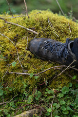Boots on the moss of the misty mountains cold of Choachi, Colombia