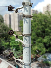high voltage electric pillar closeup on road