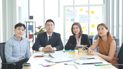 Group of asian creative design meeting brainstorm ideas to plan and develop project at office, Asia small business startup coworker, colleagues working  for the solution, Corperate team