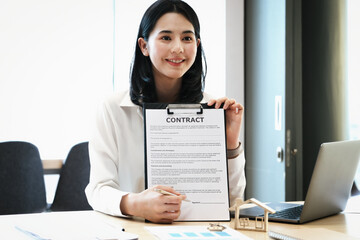 estate agent gives pen and documents agreement with customer to sign contract. Concept agreement.