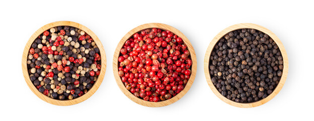 Mixed of peppers hot, red, black, white in wood bowl isolated on white background