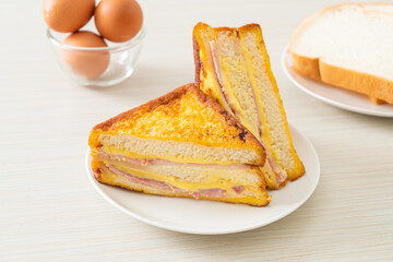 sandwich ham cheese on white plate