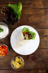 Chicken shawarma with garlic sauce.
