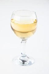 white wine in transparent glasses on a white background
