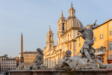 Fototapeta na wymiar Piazza Navona, the Neptune fountain and the church of St. Agnes in the early morning