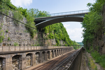 A new bridge across a small river. Summer time. 
Small reinforced concrete bridge after reconstruction. New asphalt.