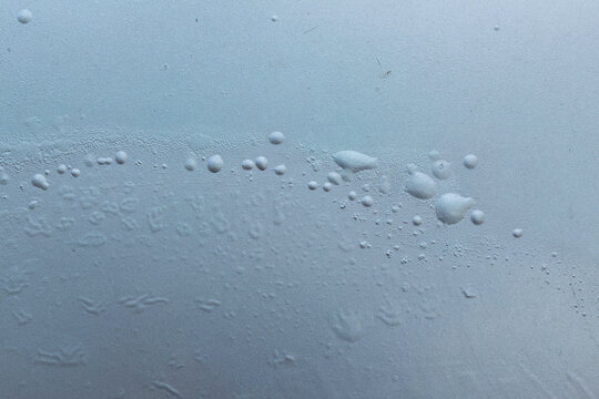 close up blistering paint on car