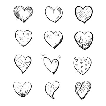 Hand drawn heart symbols doodle vector. Set of hand drawn, sketch, drawing heart symbols in black and white illustration.