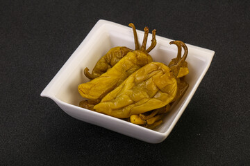 Marinated spicy and hot green pepper