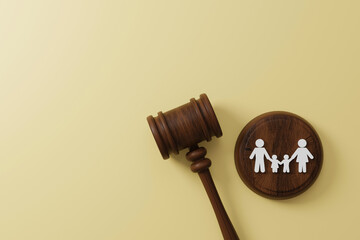 Top view of judge gavel and icon human family. Family law or divorce, legality, adoption concept....