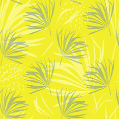 Fototapeta na wymiar Tropical palm leaves. Seamless modern pattern with exotic plants for textile and paper products. The trending colors of 2021 are yellow and gray. Vector.