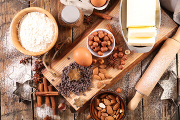 baking food ingredient- flour, butter, rolling pin, chocolate and nuts